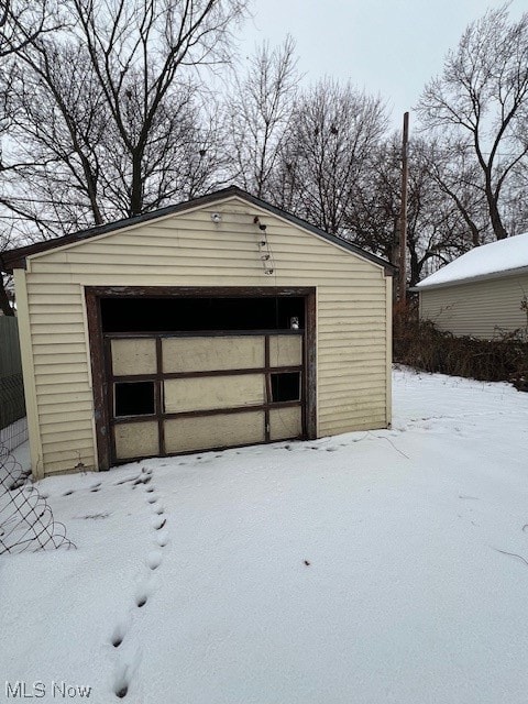 view of snow covered garage