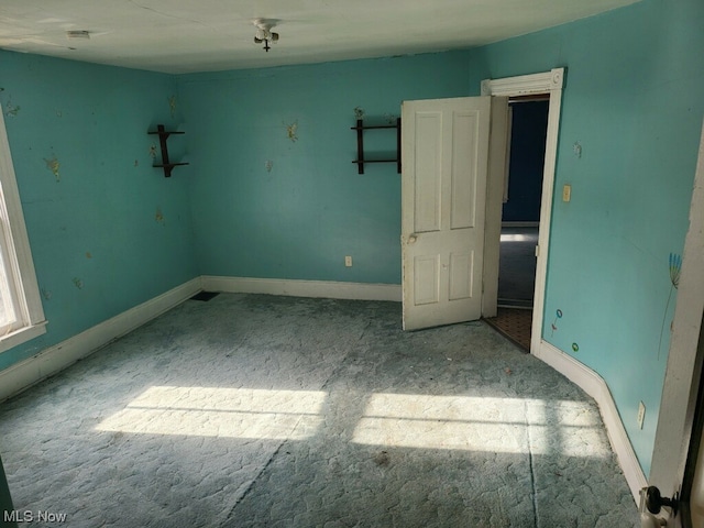 view of carpeted spare room