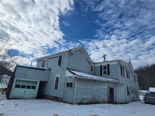 view of snow covered property