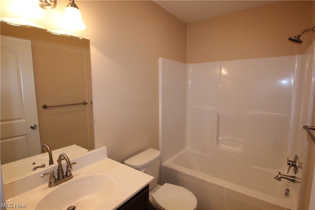 full bathroom featuring oversized vanity, shower / bathing tub combination, and toilet