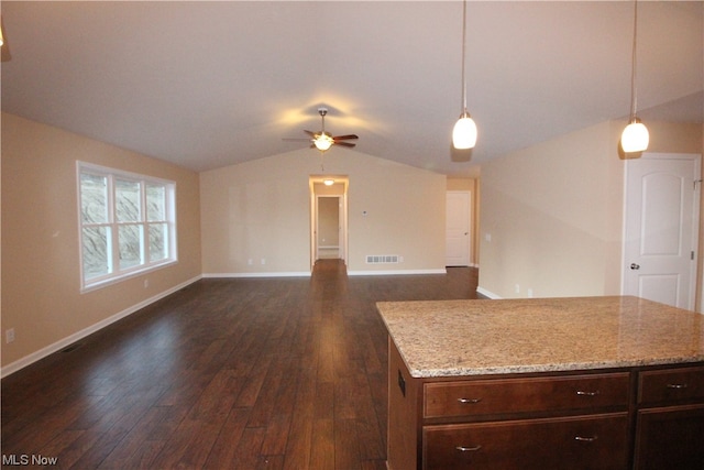 kitchen with lofted ceiling, decorative light fixtures, ceiling fan, and dark hardwood / wood-style floors