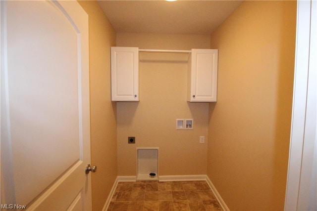 laundry area featuring hookup for a washing machine, hookup for an electric dryer, light tile flooring, and cabinets