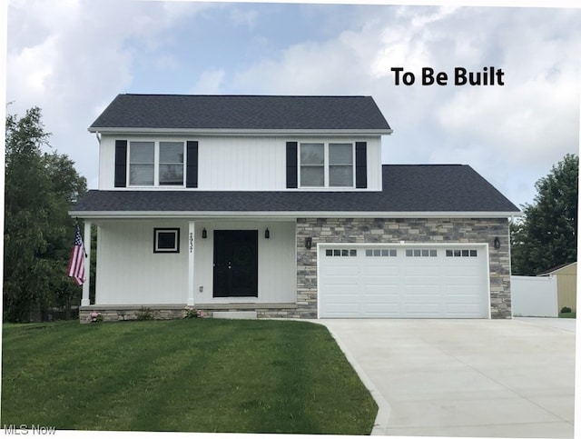 view of front facade with a front lawn and a garage