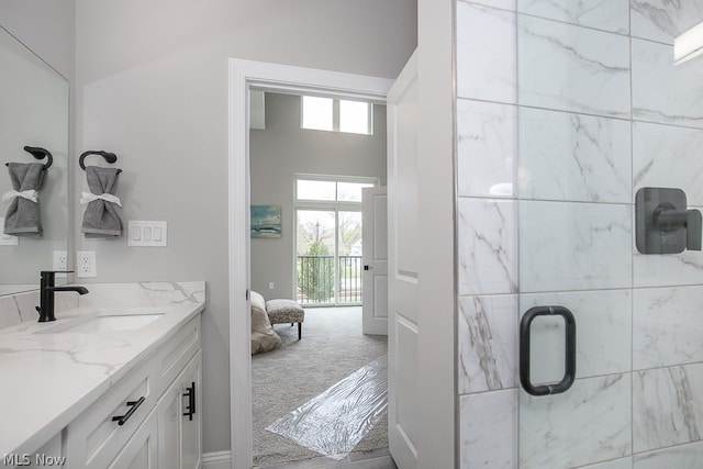 bathroom featuring vanity with extensive cabinet space