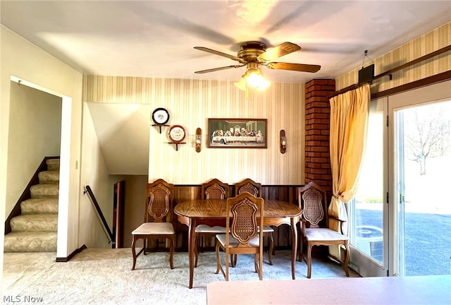 sitting room with carpet, a wealth of natural light, and ceiling fan