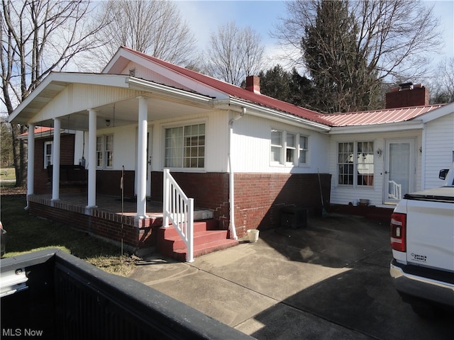 exterior space featuring covered porch