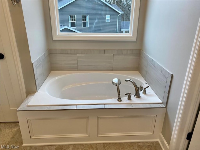 full bathroom featuring a garden tub