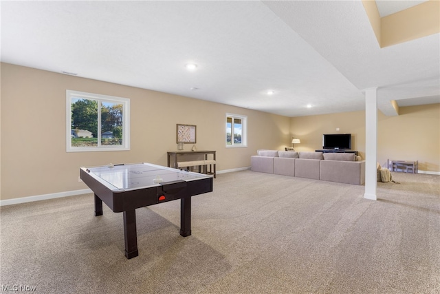 playroom with light carpet and plenty of natural light