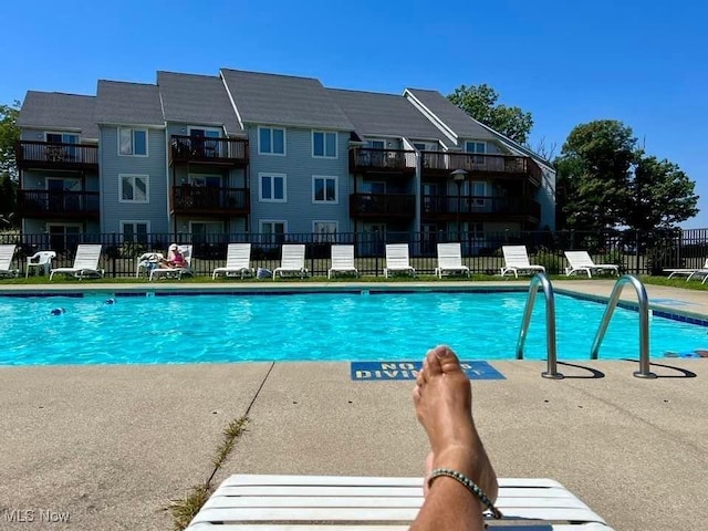 pool featuring fence