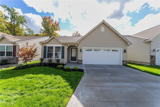 ranch-style home with a front lawn and a garage