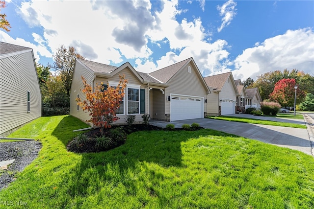 view of front of home with a front lawn and a garage