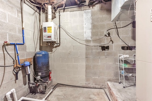 utility room with tankless water heater