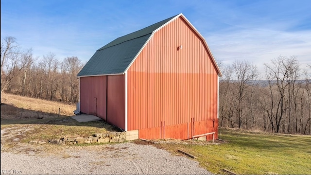 view of outdoor structure with a yard