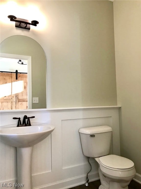 bathroom featuring toilet