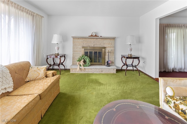 living room featuring carpet and a fireplace