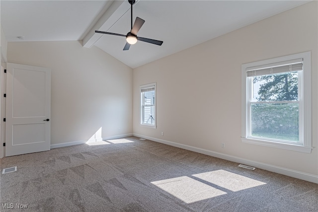 carpeted empty room featuring ceiling fan and vaulted ceiling with beams