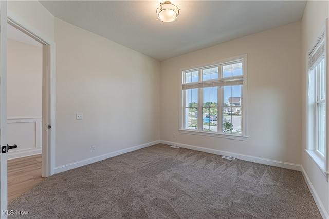 empty room with carpet floors