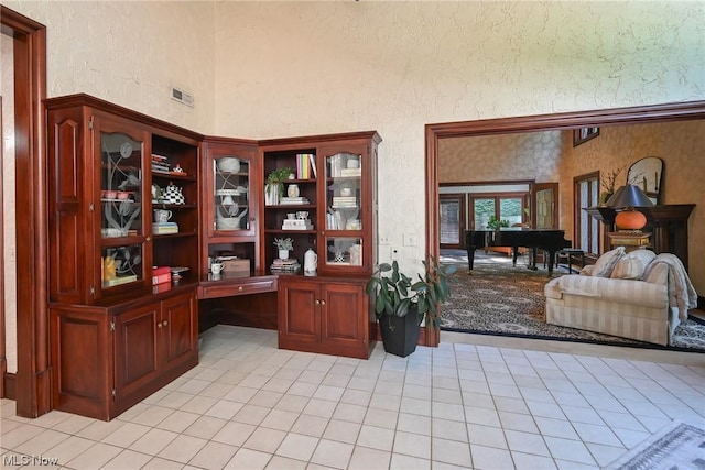 office area with light tile patterned floors