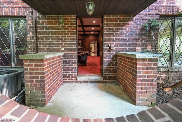 entrance to property featuring central AC