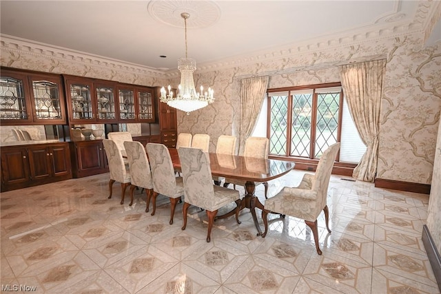 dining area featuring a notable chandelier and ornamental molding