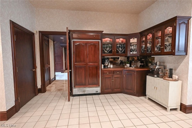 kitchen with dark brown cabinets