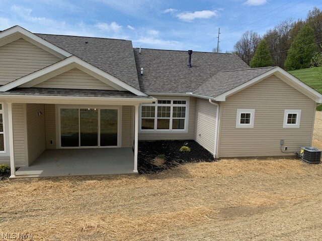 back of property featuring a patio area and central AC unit