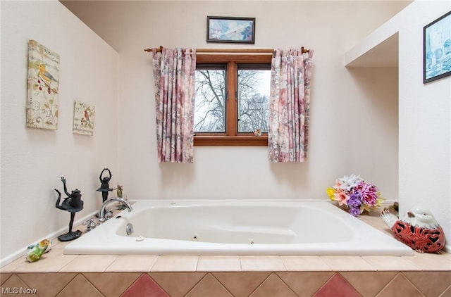 bathroom with tiled bath