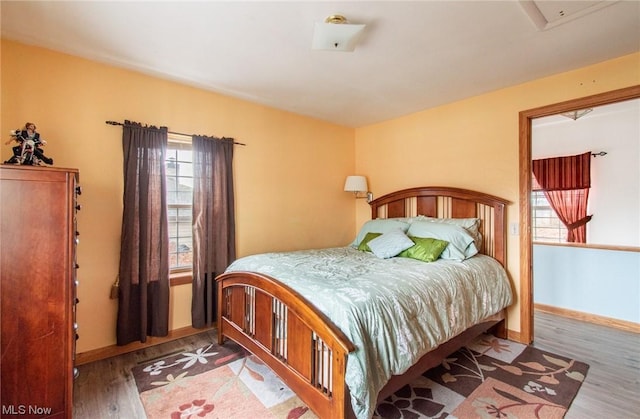 bedroom featuring hardwood / wood-style flooring