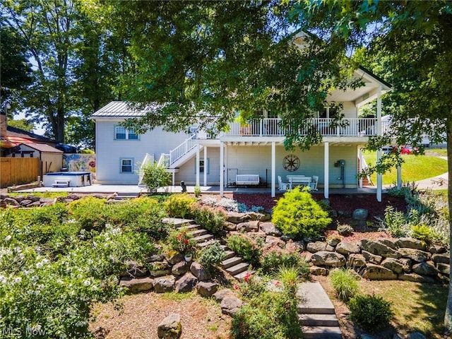 view of front of house with a hot tub