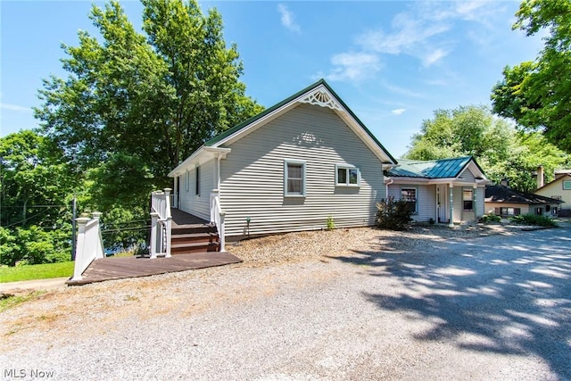 view of front of house with a wooden deck