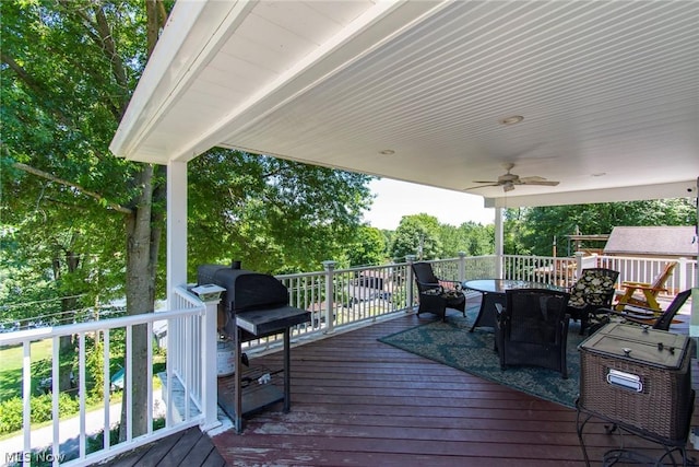 wooden deck with ceiling fan