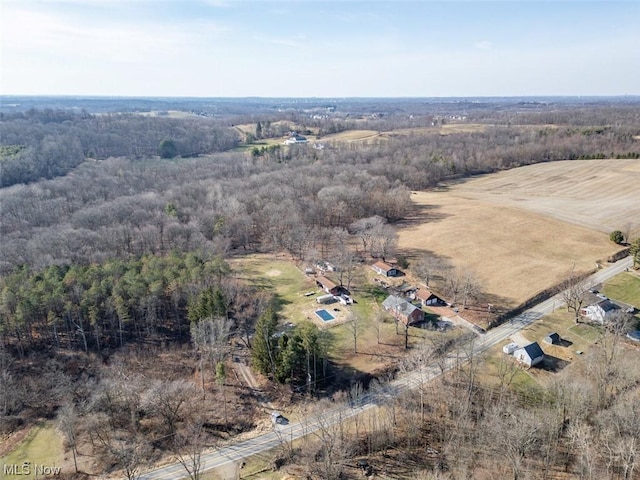 birds eye view of property featuring a rural view