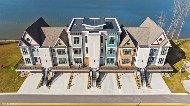 view of front facade with a water view