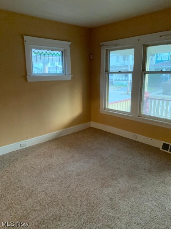 view of carpeted spare room