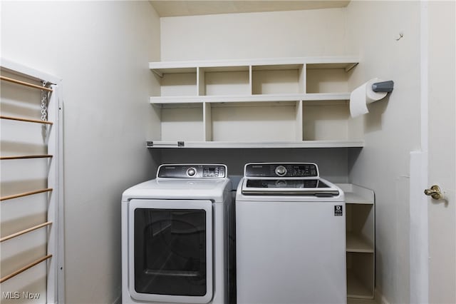 laundry room featuring separate washer and dryer