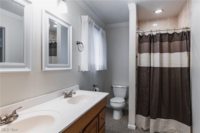 bathroom featuring curtained shower, vanity, a textured ceiling, crown molding, and toilet