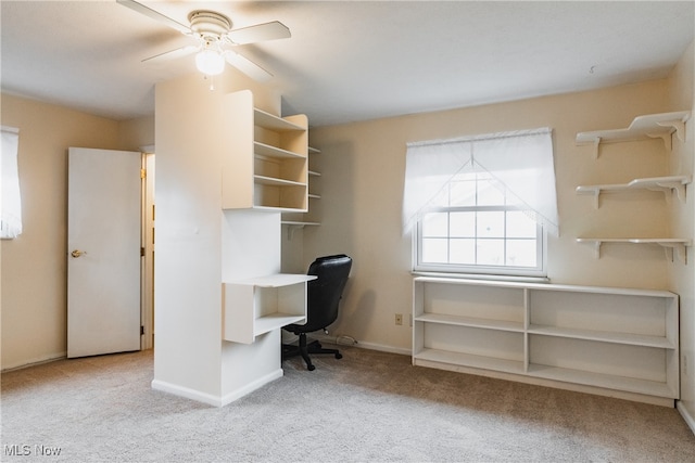 unfurnished office with light carpet and ceiling fan