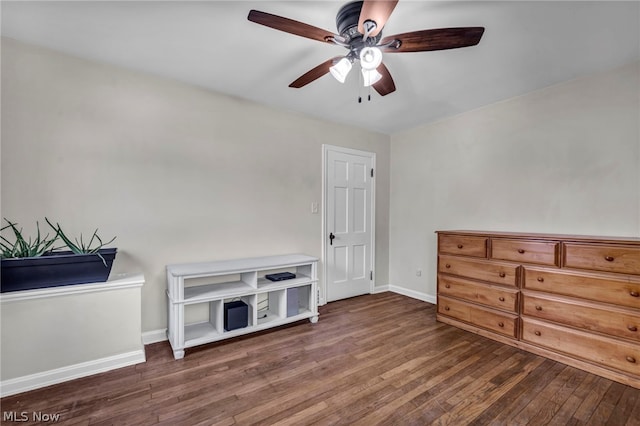 interior space featuring dark hardwood / wood-style floors and ceiling fan