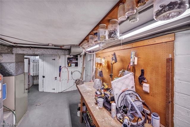 basement with a workshop area