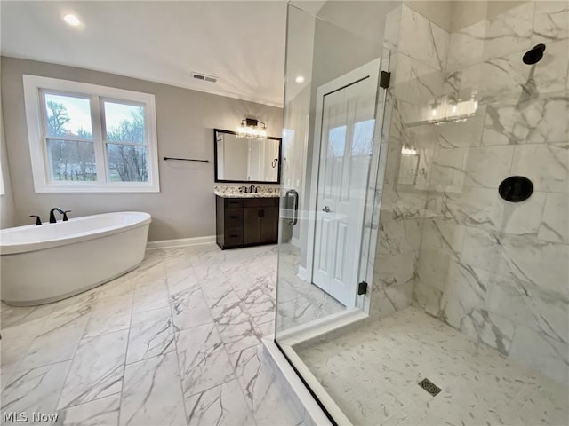 bathroom with vanity and independent shower and bath