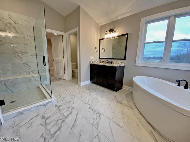 full bathroom featuring separate shower and tub, vanity, lofted ceiling, and toilet