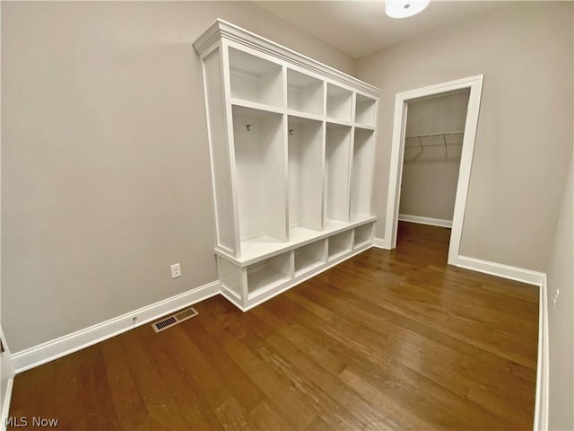 mudroom with dark hardwood / wood-style flooring