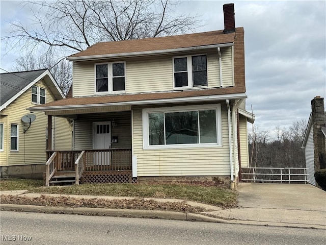 front facade with a porch