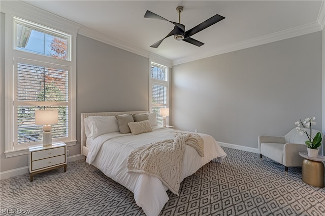 bedroom with multiple windows, crown molding, and ceiling fan