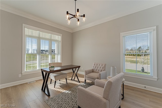 office area featuring light hardwood / wood-style flooring, a wealth of natural light, and a chandelier