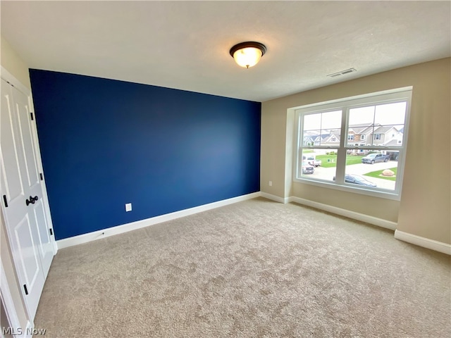 view of carpeted spare room