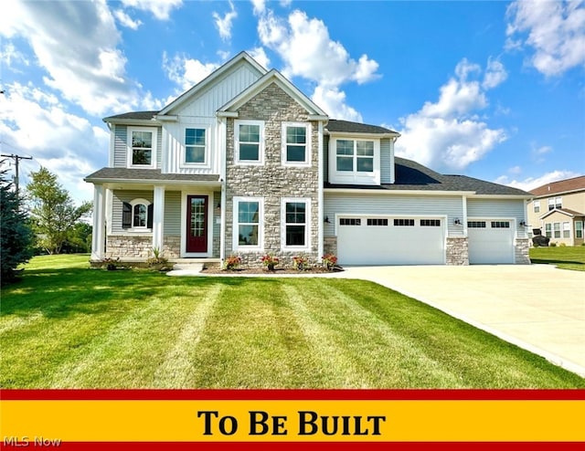 craftsman house with stone siding, concrete driveway, board and batten siding, and a front yard