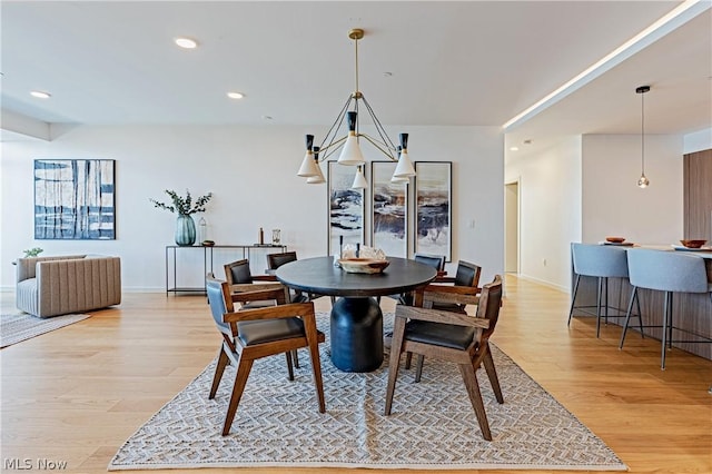 dining room with light wood-type flooring