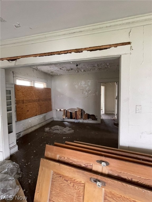 interior space featuring crown molding