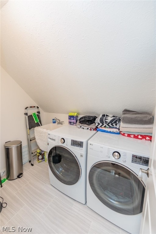 laundry area featuring independent washer and dryer